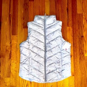 Size L vest, never worn and tags are still on.